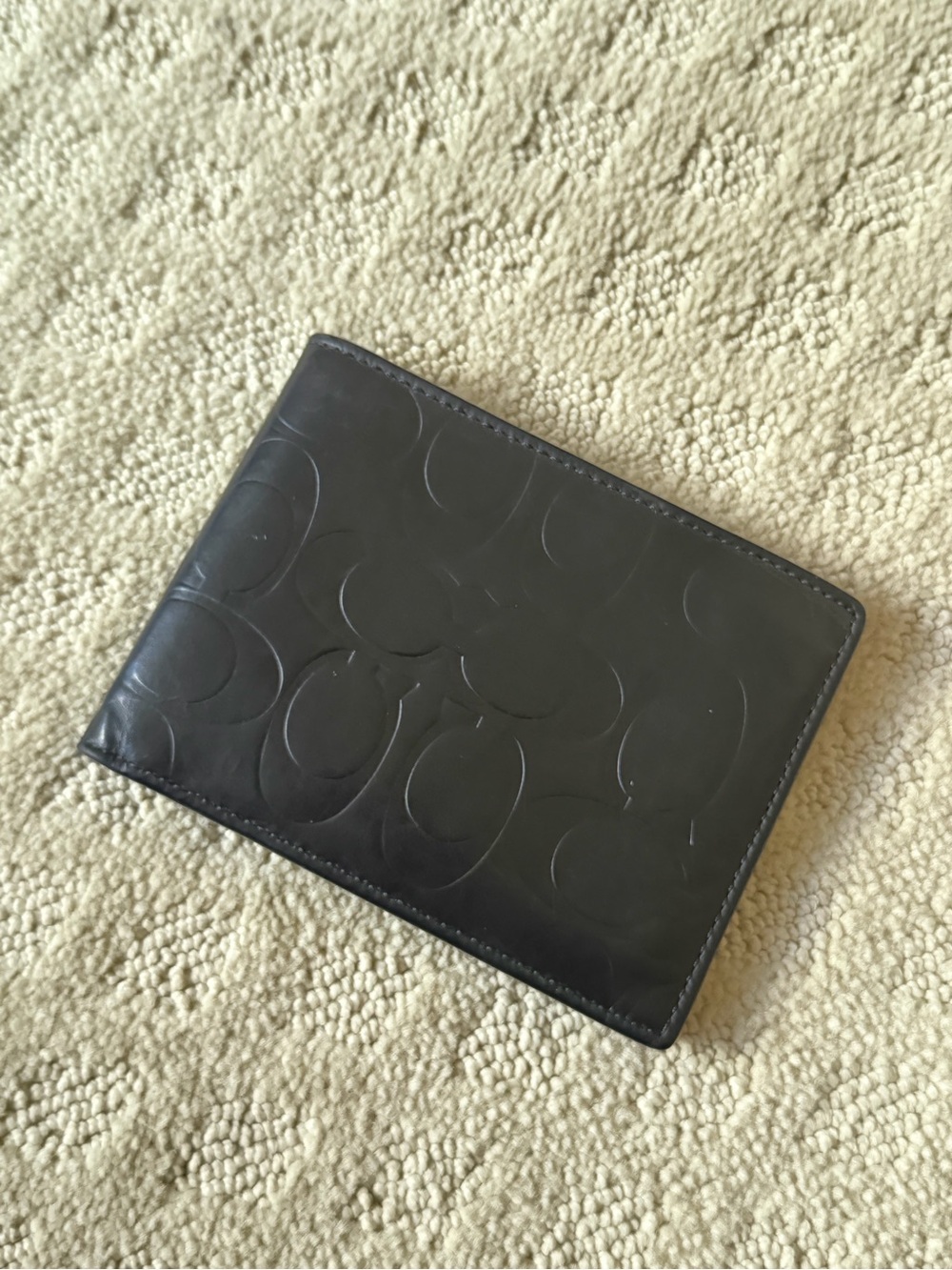 Coach Men's Black Embossed Signature Bi-Fold Wallet